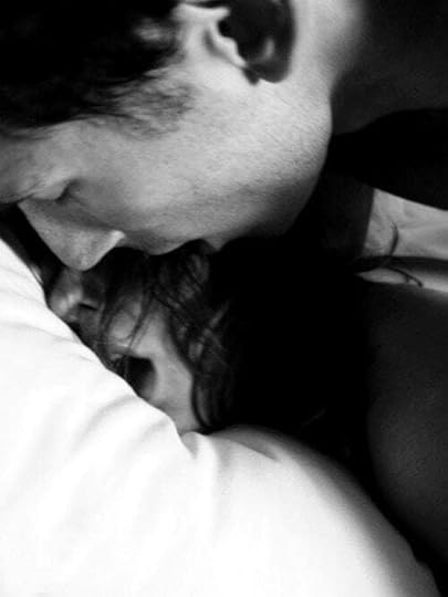 May be a black-and-white image of person, child and indoor