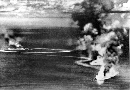 Heavy cruisers HMS Dorsetshire and HMS Cornwall burning during the raid on Ceylon, 5 Apr 1942; photo taken from Japanese aircraft (US Navy photo 80-G-71202)