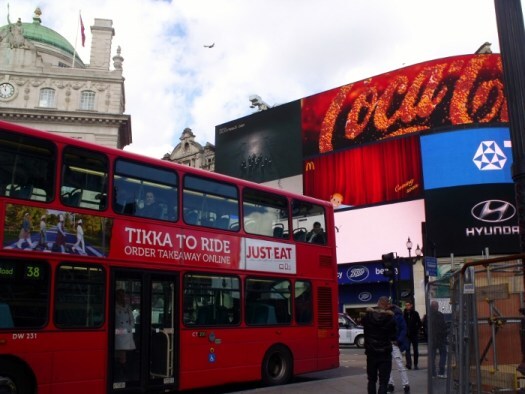 Big red bus in Piccadilly Circus, London. Ailish Sinclair | Author
