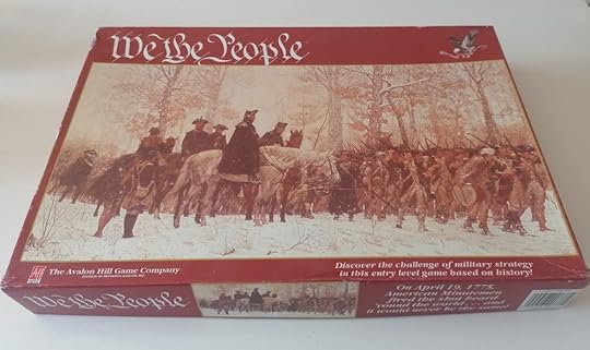 The large rectangular box of We the People with an image of Washington at Valley Forge on the front. The corners of the box are well worn, and there's some scuffing on the cover.