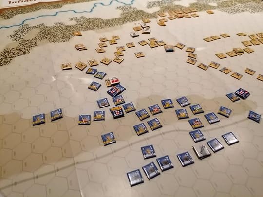 The Ayyubid cavalry counters have moved back, leaving a large space in the middle of the board. The crusader army is spread out over the bottom of the image.