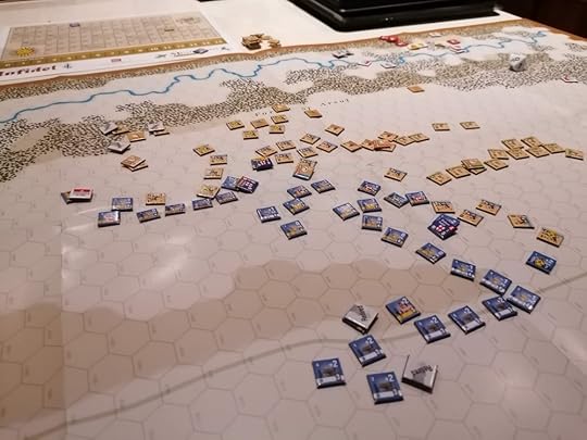 The end of the game - the Crusaders have two Retired units while the Ayyubids have a stack of dead units off the board. The Crusader line takes up most of the middle of the board, the Ayyubids still have many units but have suffered great losses
