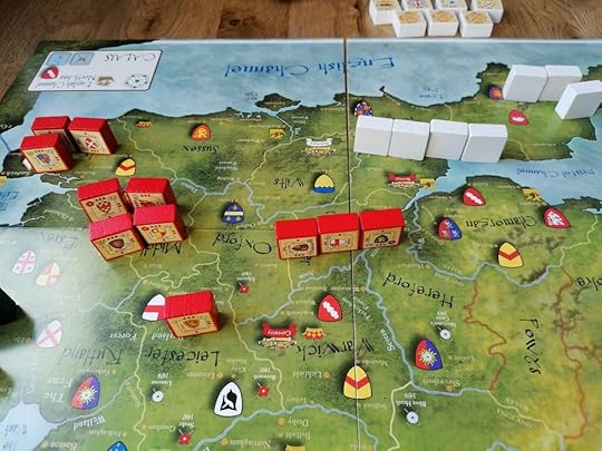 Several groups of red blocks take up the top and center left of the image. In the centre three red blocks, including the one for King Henry VI, are shown at one health each and an army of 4 white blocks is in the space next to them.