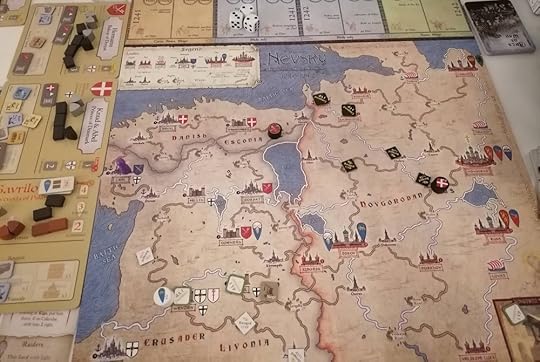 Nevsky's board, a map of Livonia, Estonia, and Novgorod/Russia. Black Teutonic victory markers cover northwest Novgorod and white Rus victory markers cover southwest Livonia.