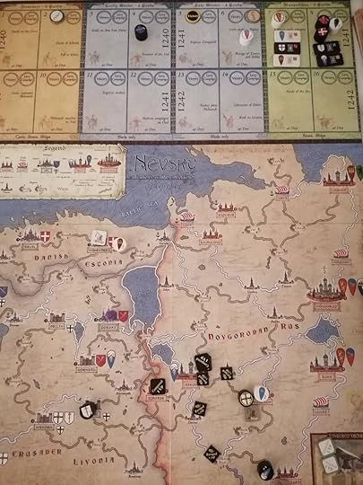 Game board shows a Rus cylinder in northern Teutonic territory, plus one other next to a Teutonic marker south-east of Pskov in Rus territory. South of them the cylinder of a Teutonic lord is at a Rus city & another Teutonic is in a friendly city