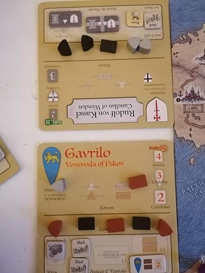 Rudolf and Gavrilo's lord mats facing each other. All of Rudolf's unit blocks are in the Routed section while Gavrilo still has a single Knight and Militia block in his ready box.