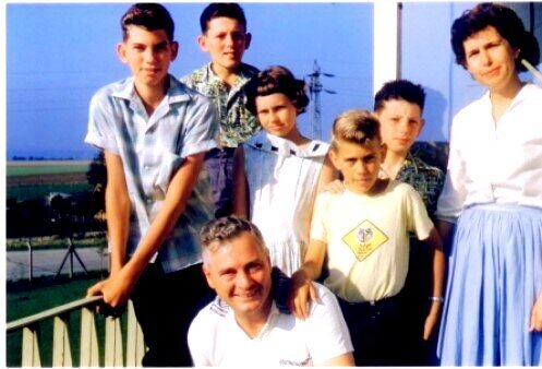 L-R My brother Louis, Michel, Me my brother Michael,Daniel, My mother and kneeling is my father