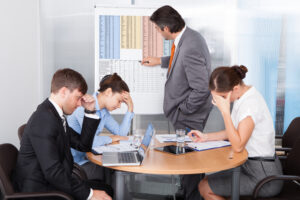 Boring person going over data at a flip chart