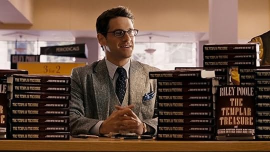 Riley Poole sits surrounded by his books in National Treasure 2