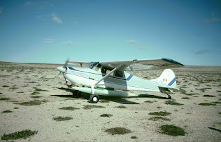 Airplane lands with kayaks