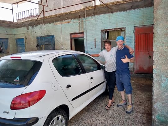 Friendship at a car wash in Shushtar, Iran