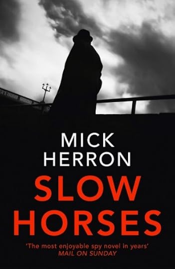 [Book cover: dark figure against sky]