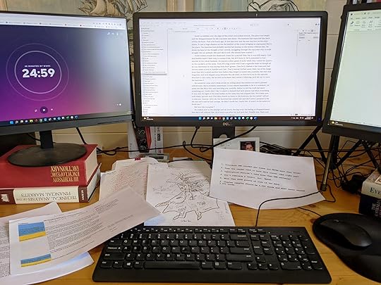 [Cluttered desk]