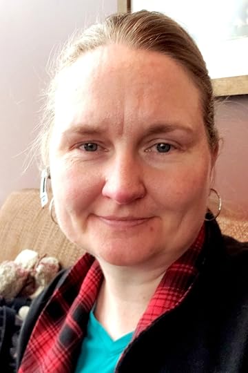 Selfie of Talena Winters in a coffee shop, no makeup.