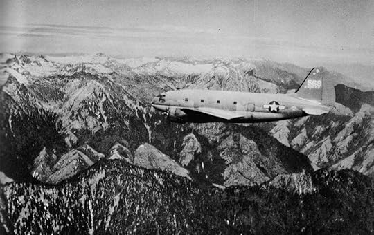 US C-46 Commando cargo plane flying over the “Hump” during World War II (US Army Air Forces photo)