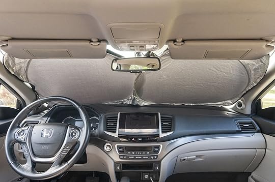 EcoNour Car Sunshade is one of many road trip essentials you need this summer