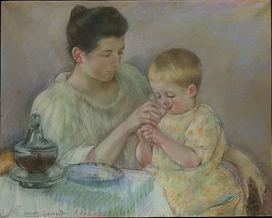 Mother helping child drink