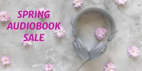 Grey headphones on a background with pink flowers, and words Spring Audiobook Sale