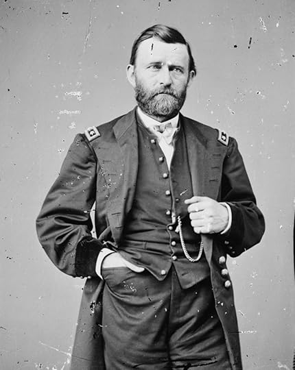 Grant posing collared shirt, partially buttoned vest and unbuttoned military overcoat