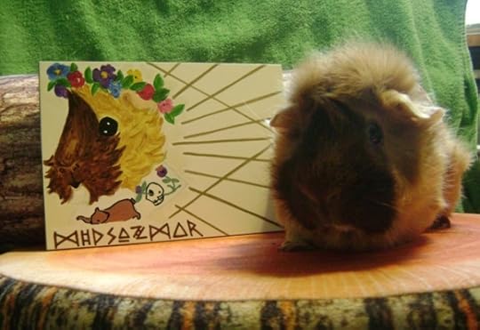 Ozma guinea pig with Rachel E. Smith painting