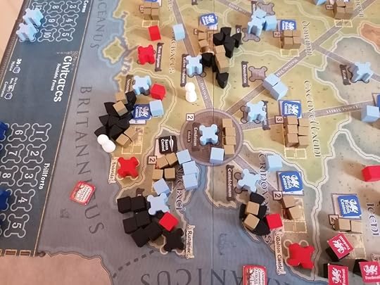 Zoom in of the south-east of England part of the board. There are approximately 25 black Saxon raider pieces crowded into three areas near the Saxon settlement