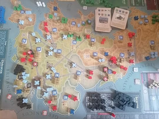 Pendragon's board, bottom left is a second Saxon settlement marker with 7 warband cubes. Several Dux pieces are in the adjacent region and Scottie pieces scatter across the top of the board
