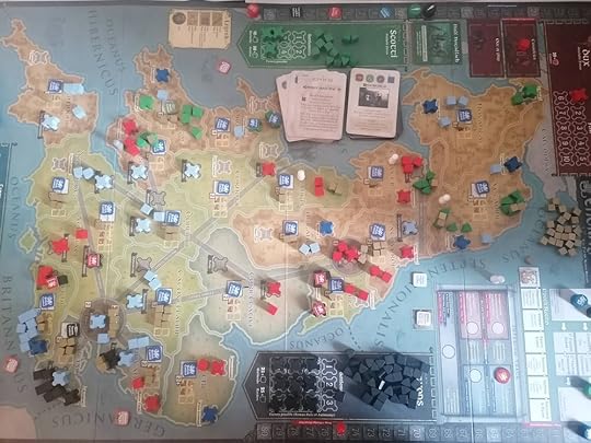 End state of the game, an Epoch card showing in the middle. Approximately 13 Scotti raiders occupy the northern part of the board, while one of the Saxon settlements has been replaced by seven Civitates cubes and 3 Dux cubes.