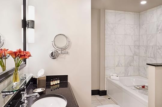 Bathroom with luxury hotel amenities and products at the French Quarter Inn