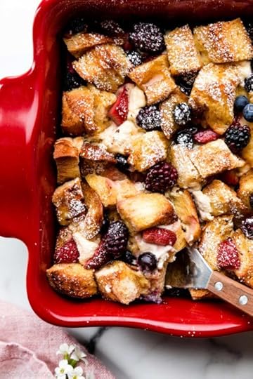 berry and cream cheese French toast casserole bake in red dish