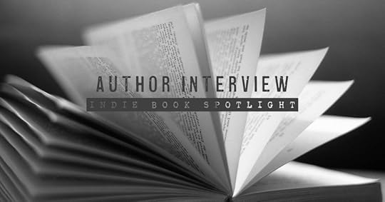 an open book with pages spread; text says 'author interview: indie book spotlight' 