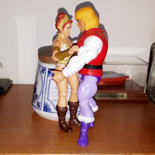 Adam and Teela hugging