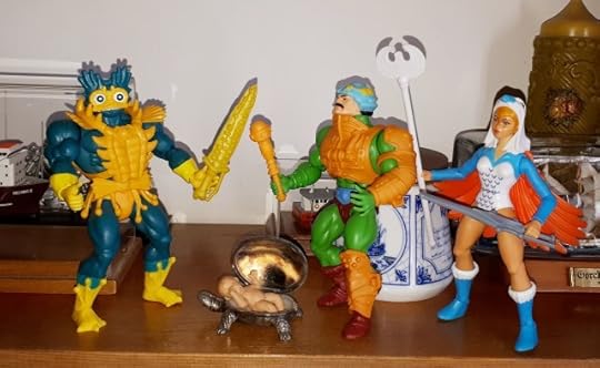 Duncan and the Sorceress fight Mer-Man over Baby Teela