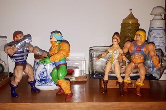 Fisto threatens Duncan, while He-Man and Teela look on