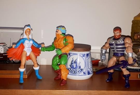 Duncan confronts the Sorceress, as Fisto looks on.
