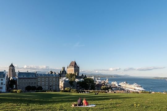 Couple having picnic in Quebec in summer one of the cheap summer vacations