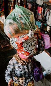 Carrying a burden on head