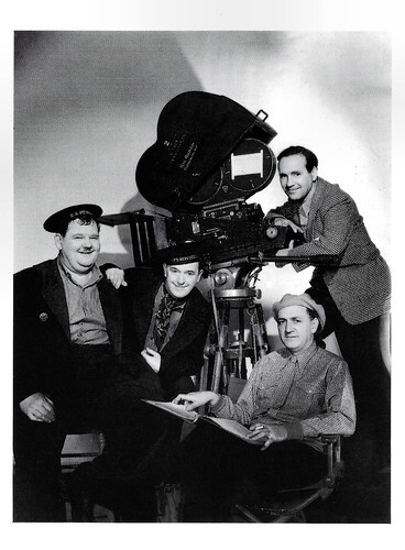 Oliver Hardy, Stan Laurel, Harry Lachman and Rudolph Mate, on the set of Our Relations (1936)