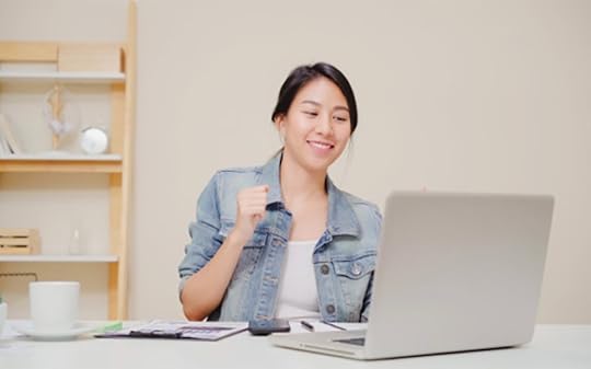 happy young girl laptop freelancer