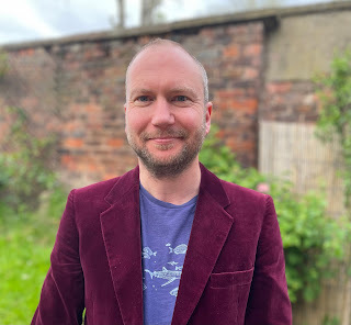 Photograph of writer Simon Guerrier, 2022