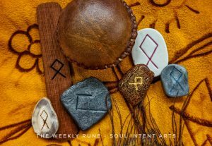 The Elder Futhark rune Othala in cedarr, reindeer antler, wrought iron, Baltic amber, porcelain, and polymer clay