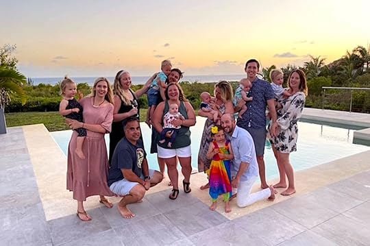 Group of people with young children at sunset