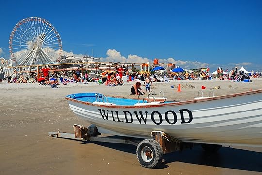 jersey shore beaches crowded wildwood beach with ferris wheel in the background