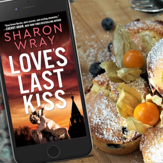 iPhone with an image of the cover of Love's Last Kiss next to a blueberry cake.