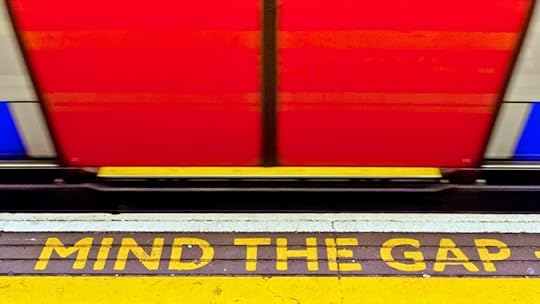 Mind the gap sign implying a compliance gap in labor law posting