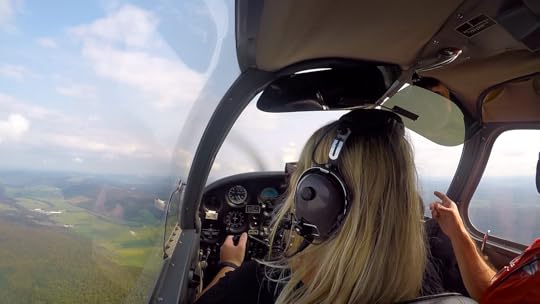 Author taking flying lessons at the controls