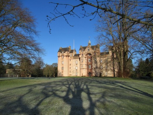 Shadows reach towards the castle.Ailish Sinclair | Castles in the Snow