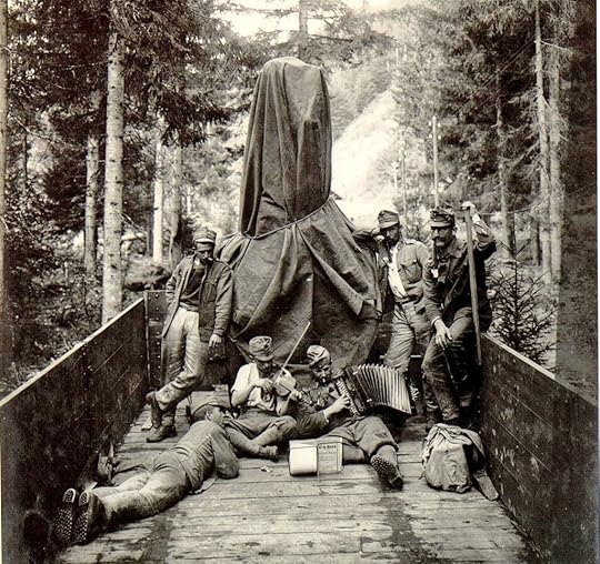 [Austro-Hungarian Soldiers posing with the Škoda made 420mm caliber Howitzer (Covered with a canvas wrap in the picture), circa August, 1916]