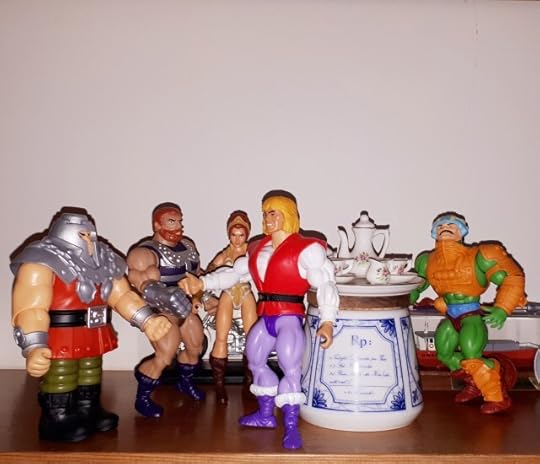 Adam shakes hands with Ram-Man and Fisto, while Teela and Man-at-Arms look on.
