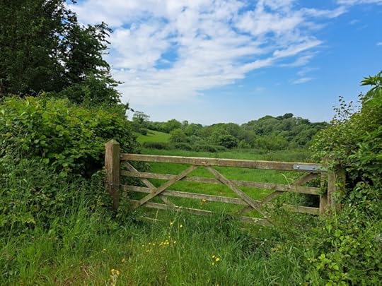 photo of gate opening up onto fields
