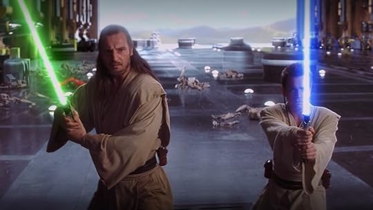 Qui-Gon Jinn and Obi-Wan Kenobi with their lightsabers drawn to fight Darth Maul inn The Phantom Menace